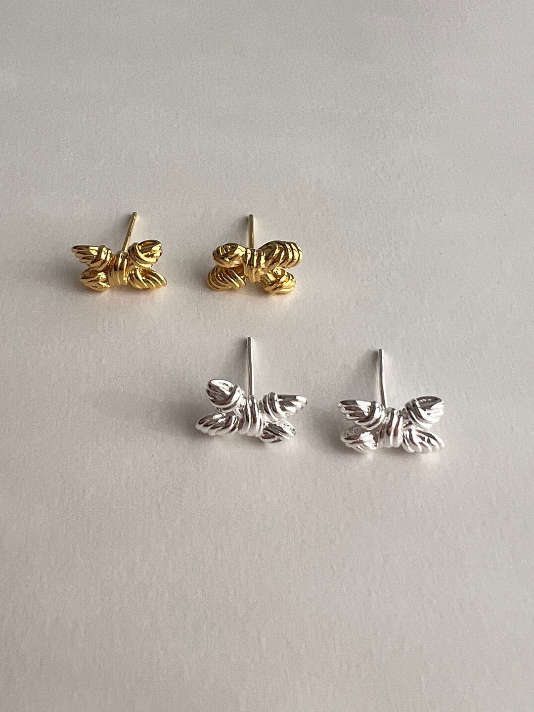 Samos Cute Twisted Bow Studs