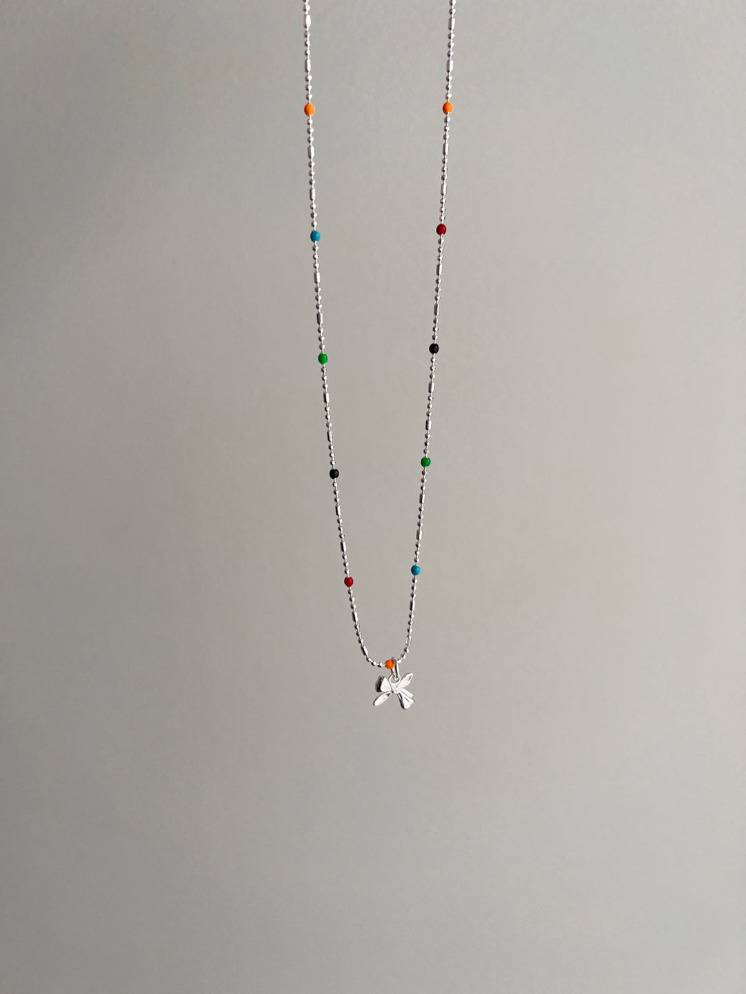 Ithaca Bow Rainbow Silver Necklace